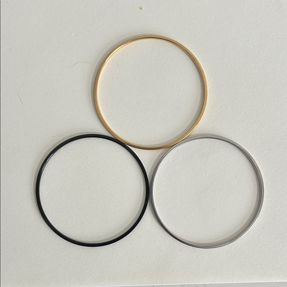 Elegant Gold, Silver, and Black Bangle Set - Picture 2 of 3